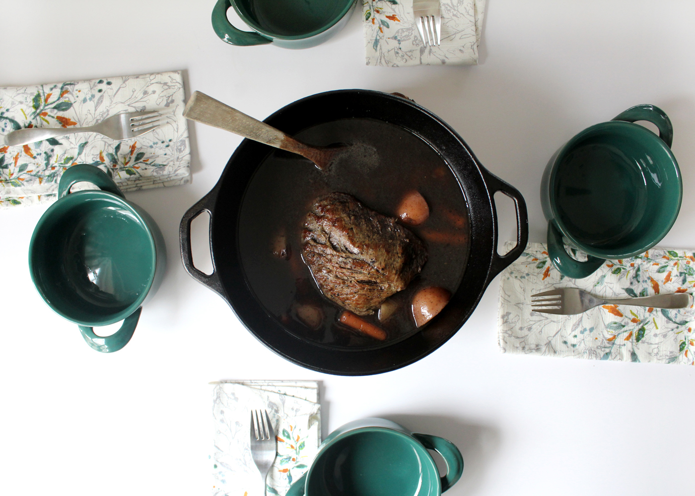 readytoservepotroastformat1500w | Tag and Tibby Make a beef chuck roast dutch oven, top down view with potatoes and carrots