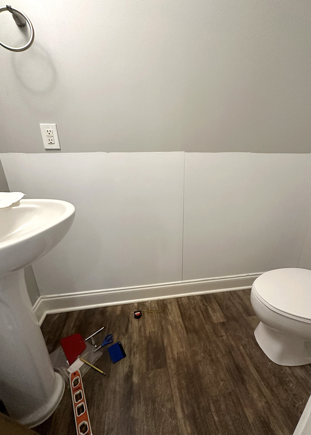 contactpaperinstall-1 | Tag and Tibby Adhere white contact paper to wall | diy faux board and batten tutorial
